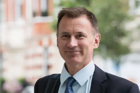 Getty Images A close up photo of Jeremy Hunt, wearing a suit and a blue tie