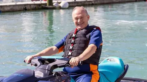 Getty Images Ed Davey on a jet ski