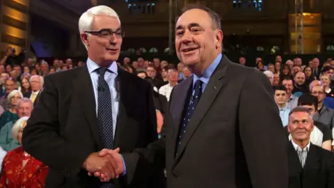 PA Media Alistair Darling and Alex Salmond at the BBC debate during the 2014 independence referendum