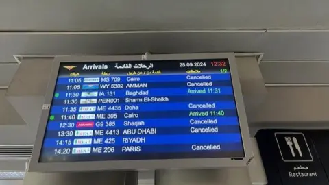 Screen at Beirut Airport showing cancelled flights 