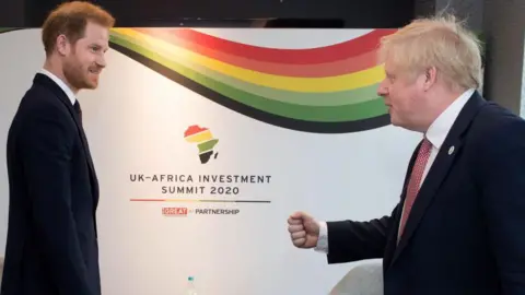 Getty Images Prince Harry meeting Boris Johnson at a UK-Africa summit in London