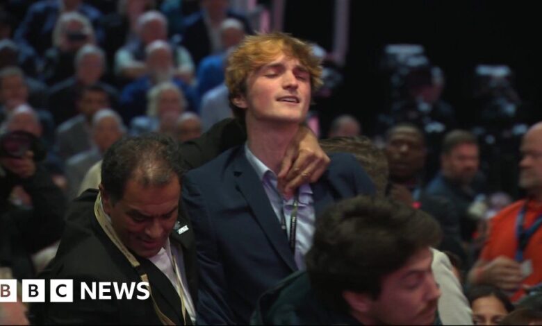 Protester dragged out after interrupting Reeves speech