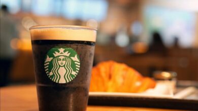 A Starbucks drink rests on a table