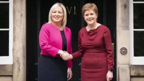 PA Media Nicola Sturgeon with Michelle O'Neill at Bute House House in 2022 