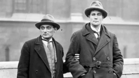 Getty Images Communist Party of Great Britain MPs Saklatvala Shapurji (1874 – 1936), left) for Battersea, and Walton Newbold (1888 – 1943) for Motherwell, at the opening of parliament, London, UK, in November 1922. (Photo by Topical Press Agency/Hulton Archive/Getty Images)