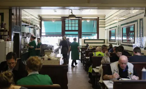 Getty Images Busy pie and mash shop in London with customers 