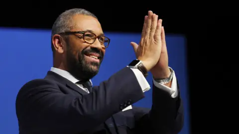 EPA-EFE/REX/Shutterstock James Cleverly thanks activists after his speech at the Conservative party conference 