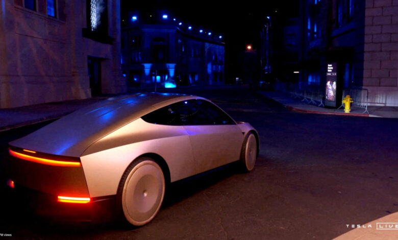 Tesla CEO and X owner Elon Musk rides in Tesla's robotaxi at an unveilling event in Los Angeles, California, U.S. October 10, 2024 in this still image taken from video. Tesla/Handout via REUTERS