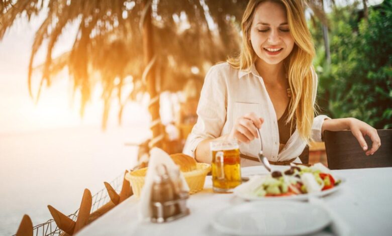 Lady Enjoying Salad by the Beach