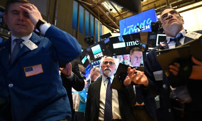 NYSE Traders working during the opening bell.