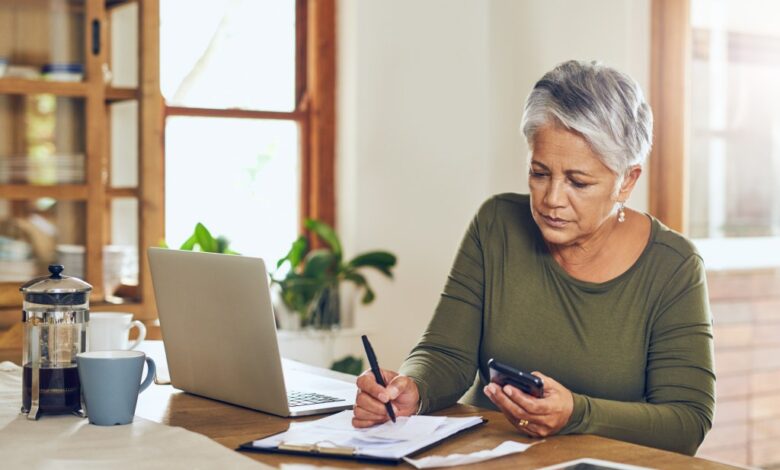 A 62-year-old woman calculates how much she would pay in taxes on a $100,000 Roth conversion.