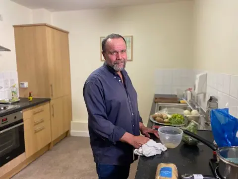 Chef Stephen standing in St Mungo's kitchen