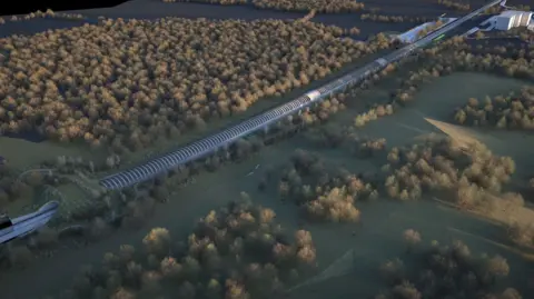 PA Media Ariel view of an artist's impression of Sheephouse Woods with the railway running alongside it, covered by the curved barrier to protect bats - which looks like a tunnel that is above ground.