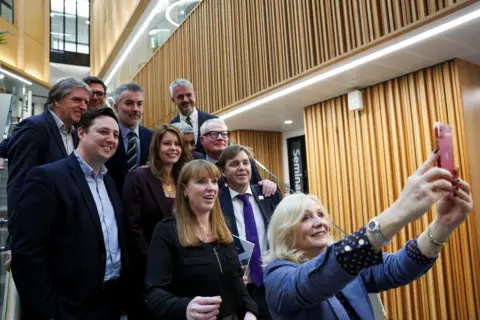 Reuters West Yorkshire mayor Tracy Brabin takes a selfie with deputy prime minister Angela Rayner and the rest of England's mayors.