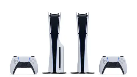 Sony A product shot of two white Playstation 5 consoles, seen in profile, against a bright white background. Both are standing vertically, and the one on the left has a physical disc drive slot. A PS5 controller stands at the side of each console.