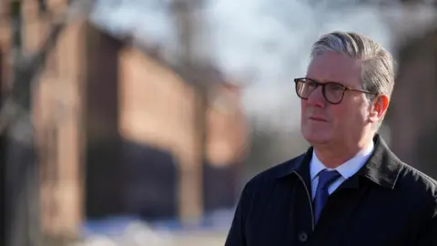 Reuters Image shows British Prime Minister Keir Starmer during a visit to the memorial and museum of Auschwitz-Birkenau, a former German Nazi concentration and extermination camp, in Oswiecim, Poland, on 17 January 2025