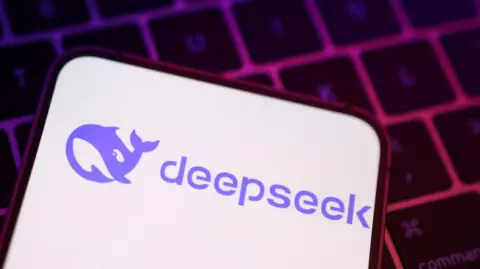 Reuters A phone screen with the DeepSeek logo, a cartoon purple whale.