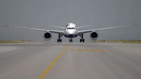 Getty Images Plane seen from head-on, on a runway at Heathrow 