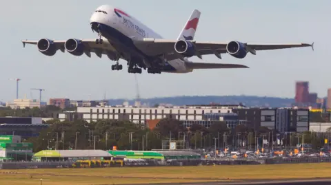 Getty Images A plane taking off at Heathrow Airport