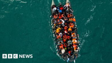 Suspected people smugglers face phone and travel ban under new laws