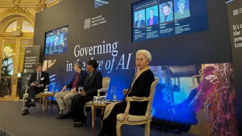 Maria Axente China's former UK ambassador, Fu Ying, on stage at a panel discussion in Paris.