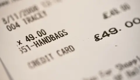 A receipt for a handbag priced at £49