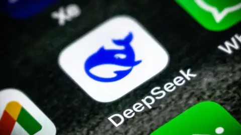 Getty Images DeepSeek logo - a purple cartoon whale - on an iPhone home screen