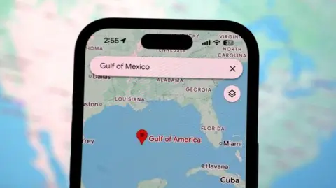 Getty Images An iPhone screen displays a Google Maps app search for 