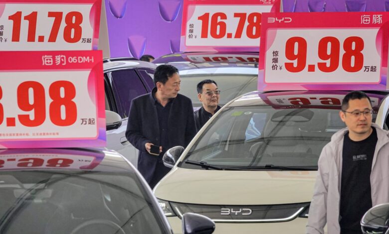 China’s EV price war is heating up. What’s behind the big discounts?