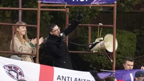 PA Media Mark Collett during a protest by nationalist group Patriotic Alternative in Tower Gardens in Skegness