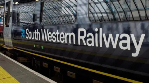 PA Media A blue train with the words