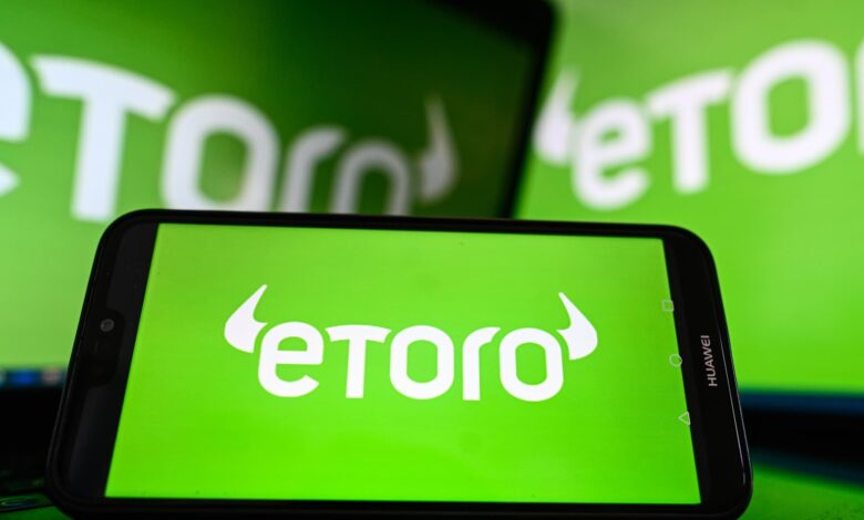 Stock and crypto trading site eToro prices IPO at $52 per share ahead of Nasdaq debut