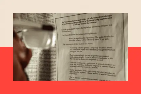 AFP via Getty A Lebanese man looks at an advertisement published in the