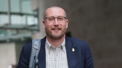 PA Media Former Cabinet Secretary Simon Case leaving BBC Broadcasting House in London, after appearing on the BBC One current affairs programme, Sunday with Laura Kuenssberg.