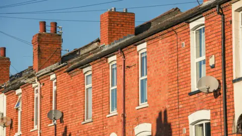 Getty Images Red brick terraced housing