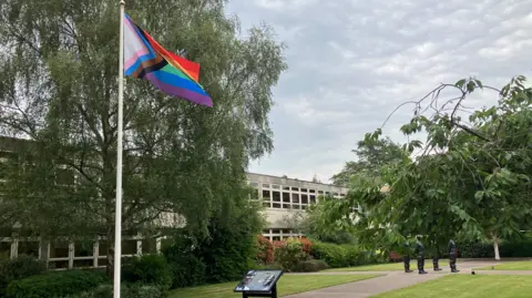 BBC A multi-coloured LGBTQ+ flag was flying outside County Hall
