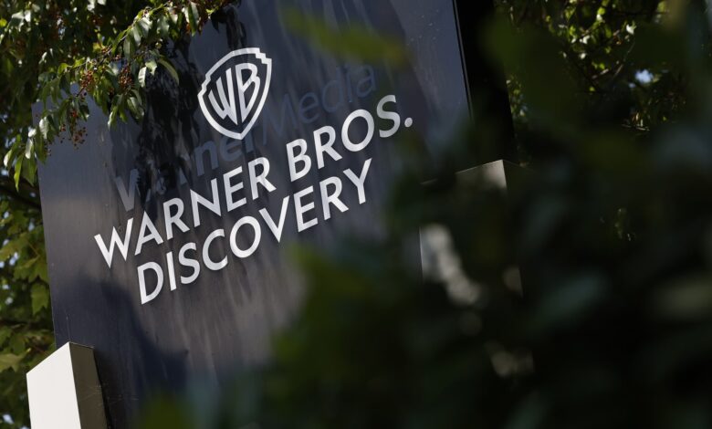 Stocks making the biggest moves premarket: Warner Bros. Discovery, Tesla, Robinhood, IonQ and more