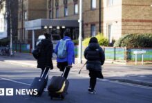 UK's asylum hotel bill down 30%, government says
