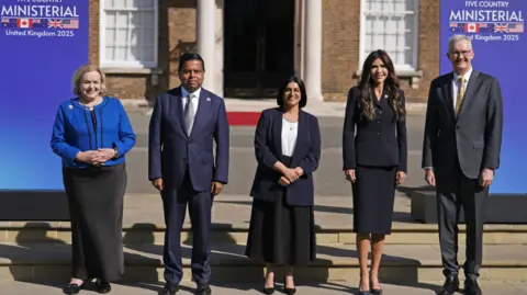 PA Media  New Zealand minister Judith Collins, Minister of Public Safety of Canada Gary Anandasangaree, Home Secretary Shabana Mahmood, US Secretary of Homeland Security Kristi Noem and Minister for Home Affairs of Australia Tony Burke at a Five Country Ministerial meeting at the Honourable Artillery Company, Armoury House, in the City of London.